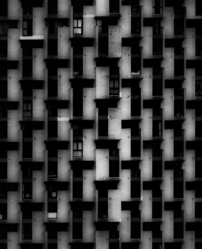 "A hundred lives". This picture was nominated in the 2026 Monovisions Award competition in Architecture Category. It represents a building façade and a lot of balcony. It emphasize the contrasts between the proximity we have with our neighbours appartment and our different walk of life.